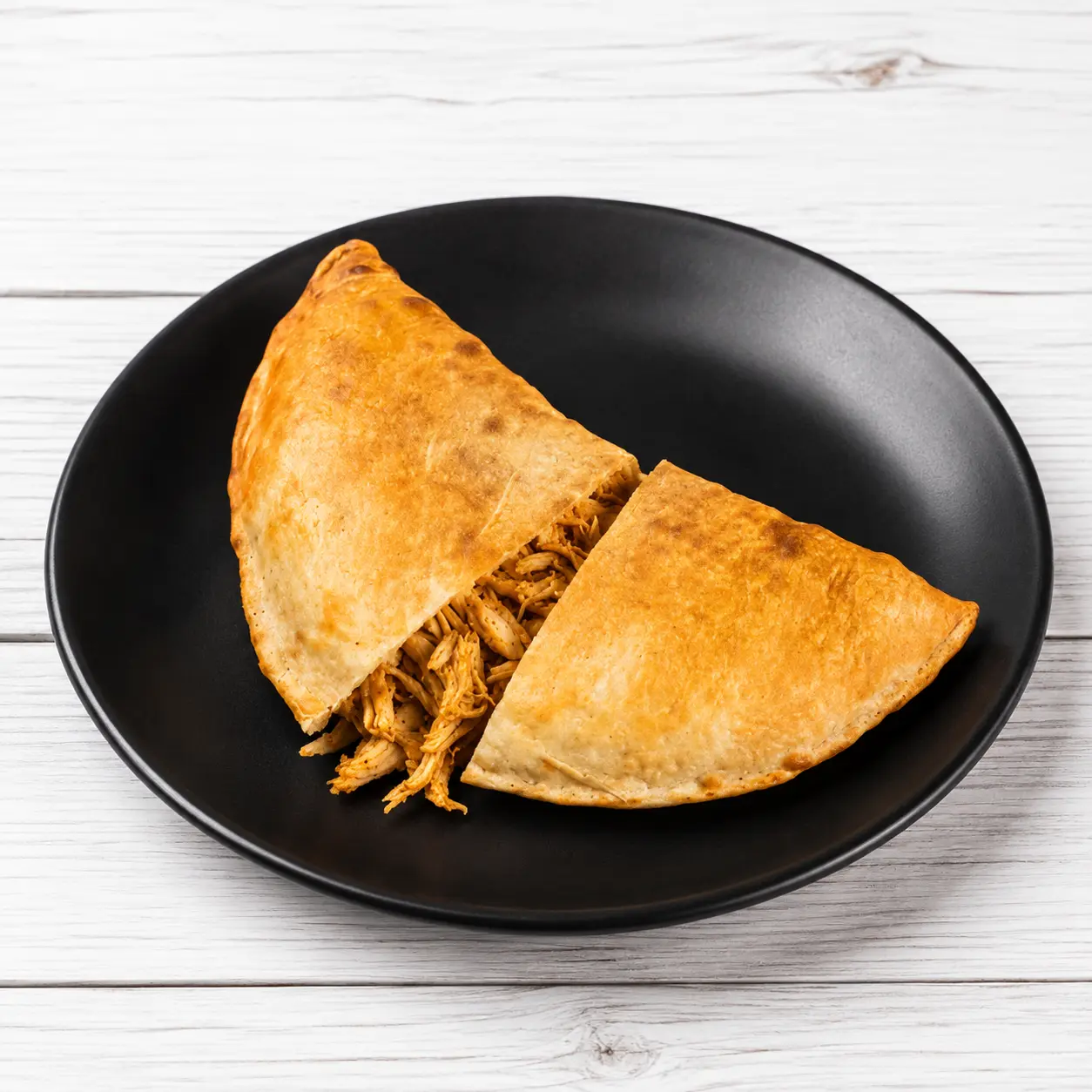 Chicken Calzone with coleslaw and Creamy Signature Sauce from Calzone Express on Shawinigan Drive SW, Calgary, AB